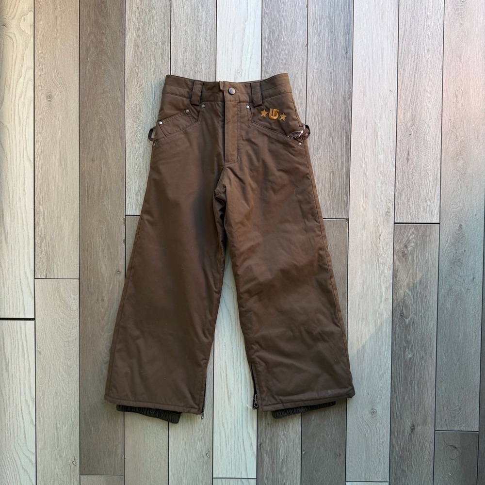 Burton Kids Wrangler snowboard pants in a roasted brown color.
